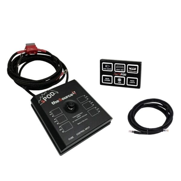 A black control panel with wires and buttons.