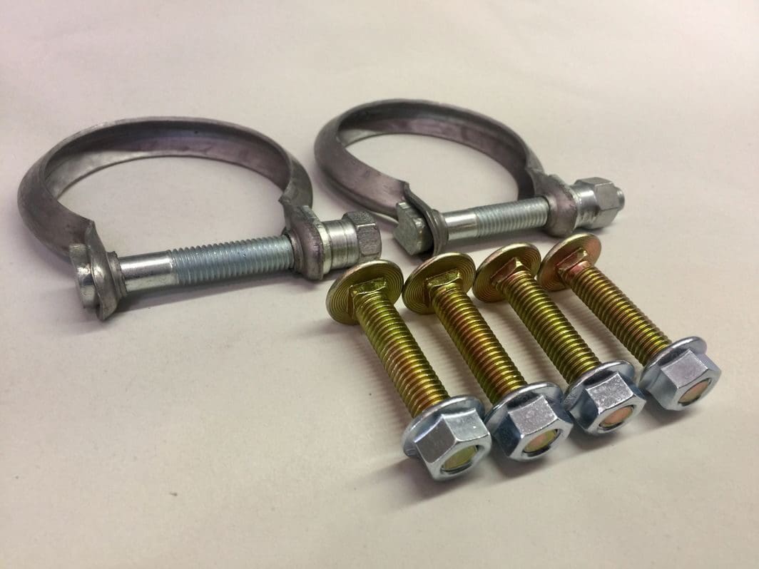A pair of metal clamps and four bolts.