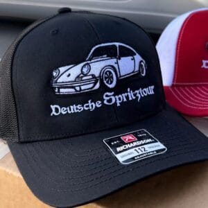 A black hat with a car on it